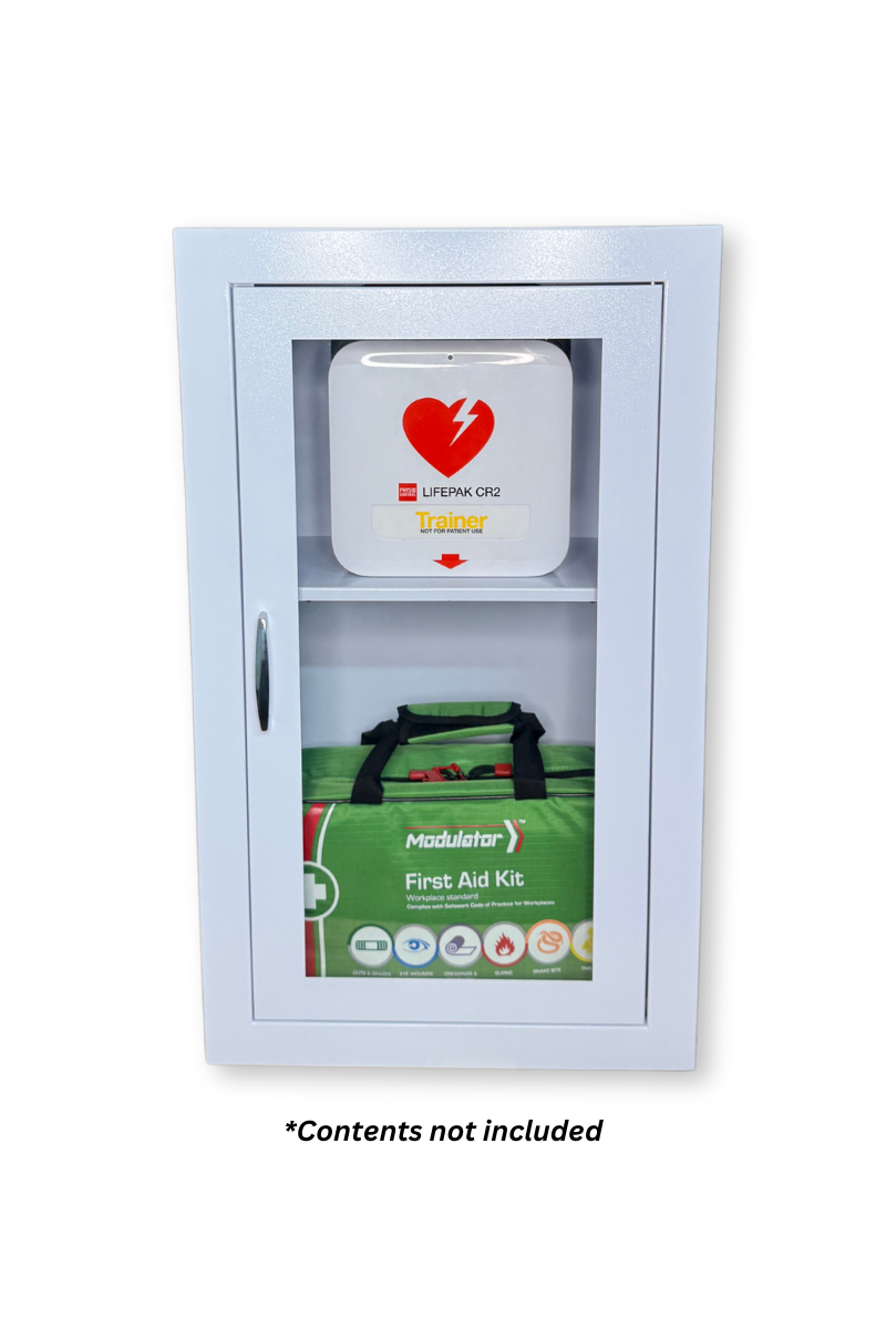 Wall-mounted white cabinet with clear door panel, designed to hold a defibrillator and first aid kit – contents not included.