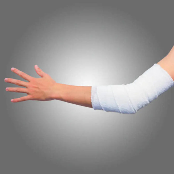 Bandage applied on forearm demonstrating compression use