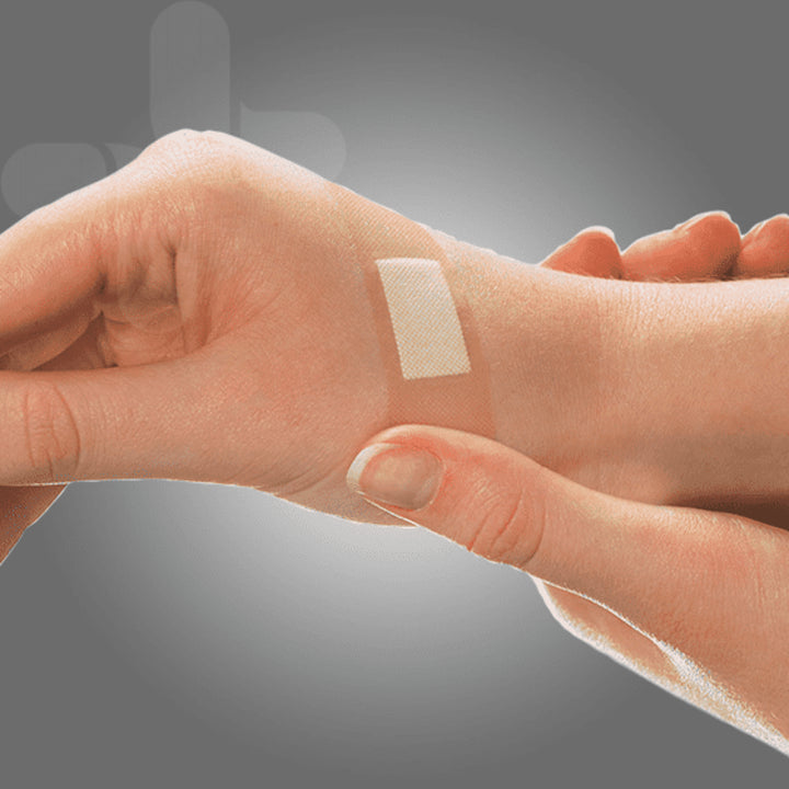 Close-up of plastic bandage applied to finger