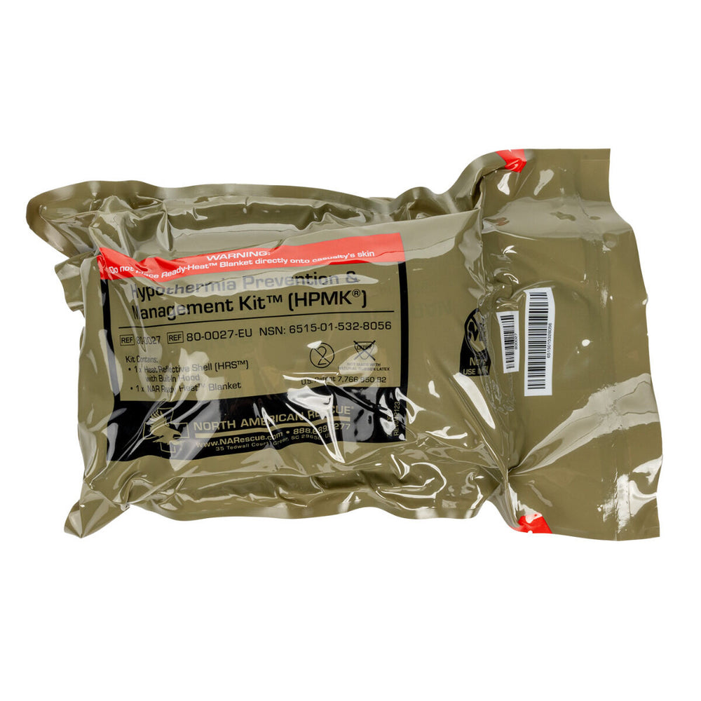 HPMK for the prevention of hypothermia during casualty care, the patented HPMK® with reinforced Heat Reflective Shell is strong, flexible, lightweight & impervious to wind & rain. Image shows the HPMK in original vacuum sealed packaging with white background