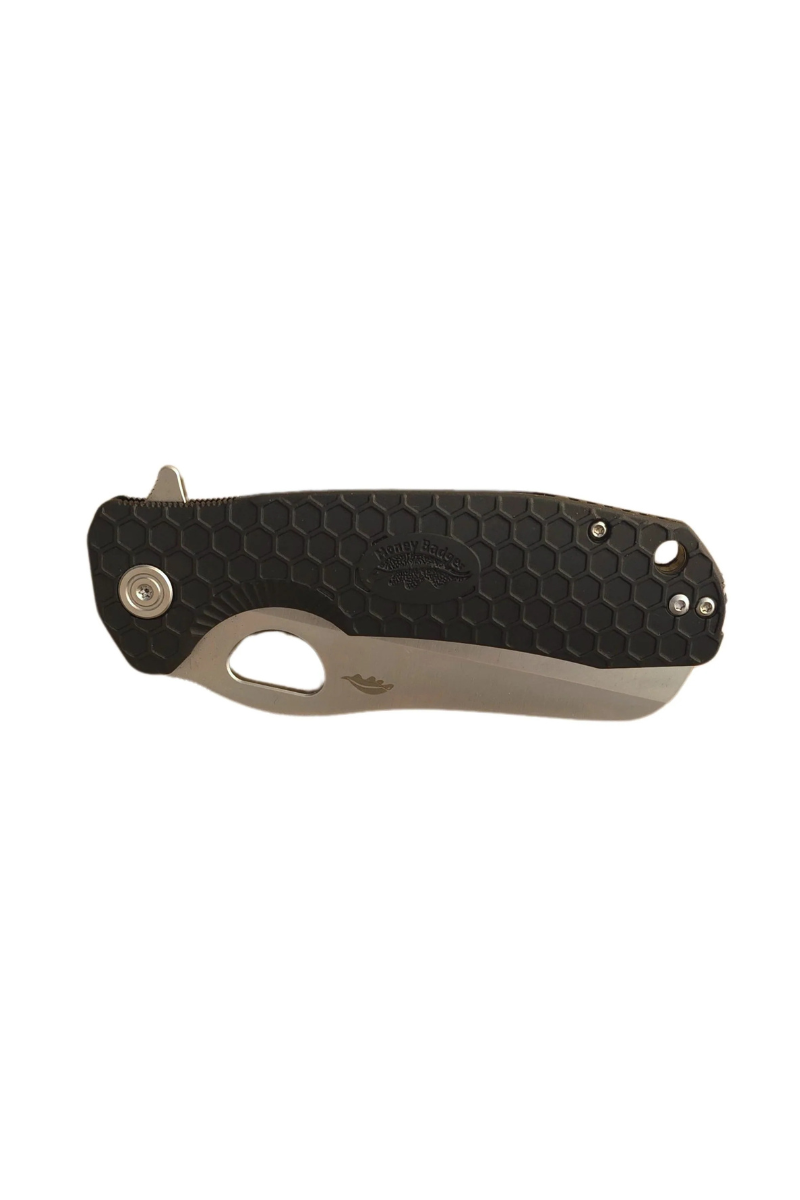 Black Honey Badger rescue knife in closed position showing front side with textured handle and silver hardware