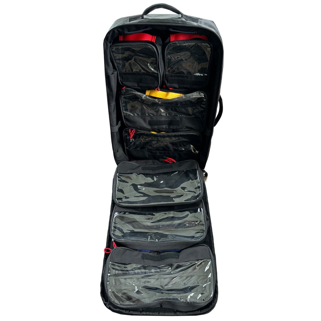 Fully opened Paratus pack showing multiple internal compartments filled with medical supplies.