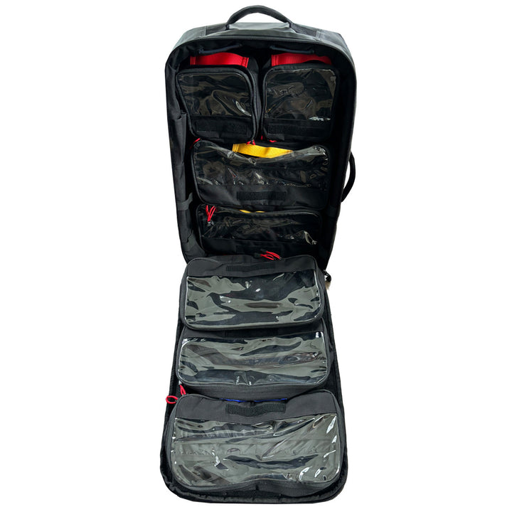 Fully opened Paratus pack showing multiple internal compartments filled with medical supplies.