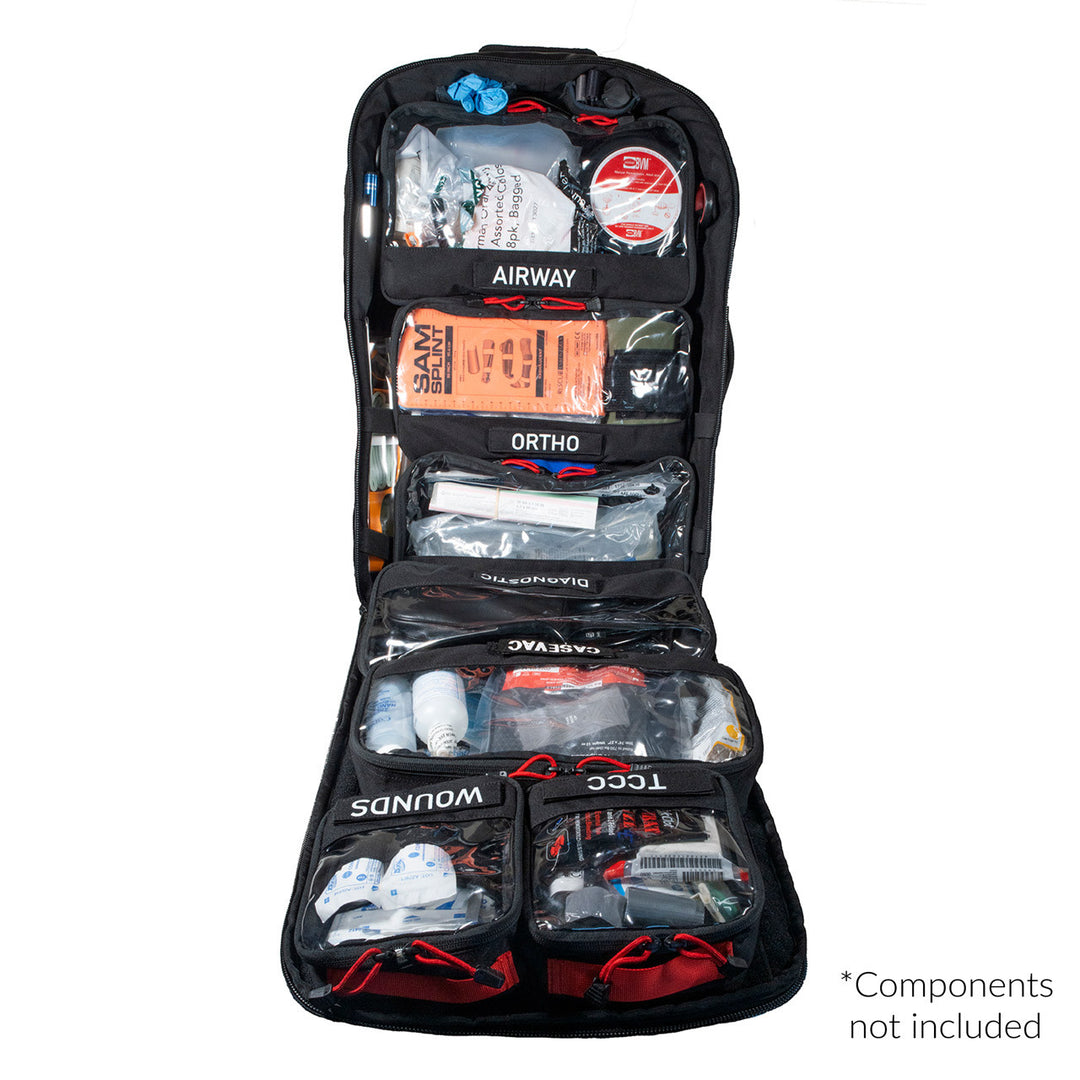 Interior view of Paratus tactical pack with labeled mesh pouches and zippered sections