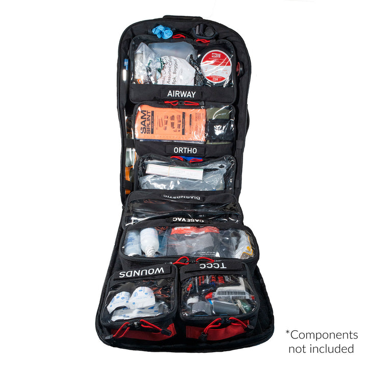 Interior view of Paratus tactical pack with labeled mesh pouches and zippered sections