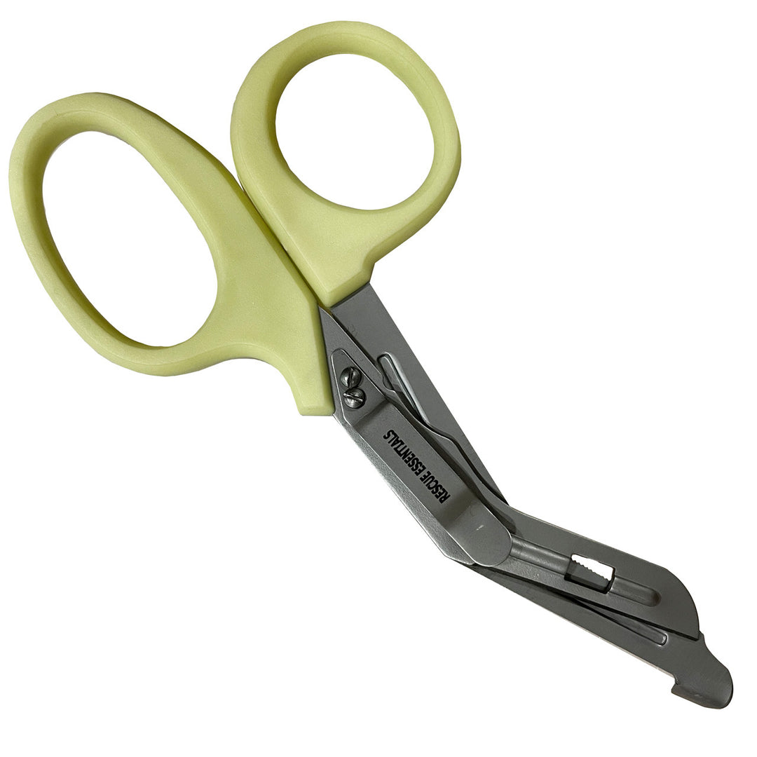 Rescue Essentials trauma shears with glow-in-the-dark handles and stainless steel blades.
