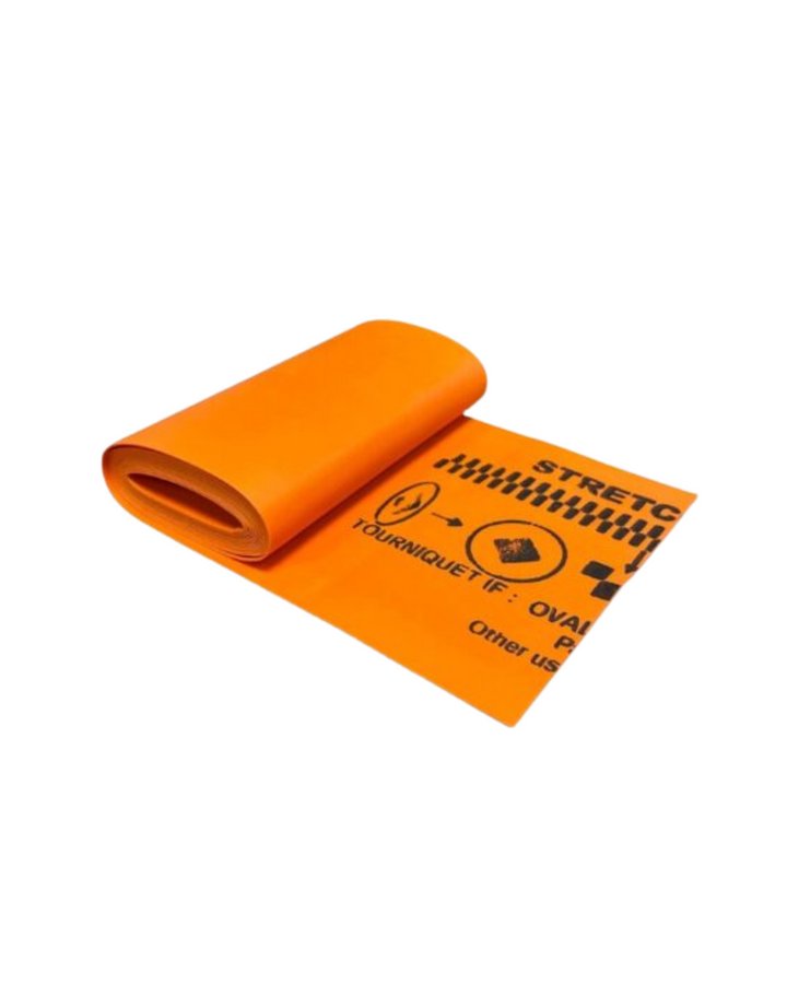 Rolled SWAT-T Stretch Wrap and Tuck Tourniquet in bright orange with printed usage instructions visible.