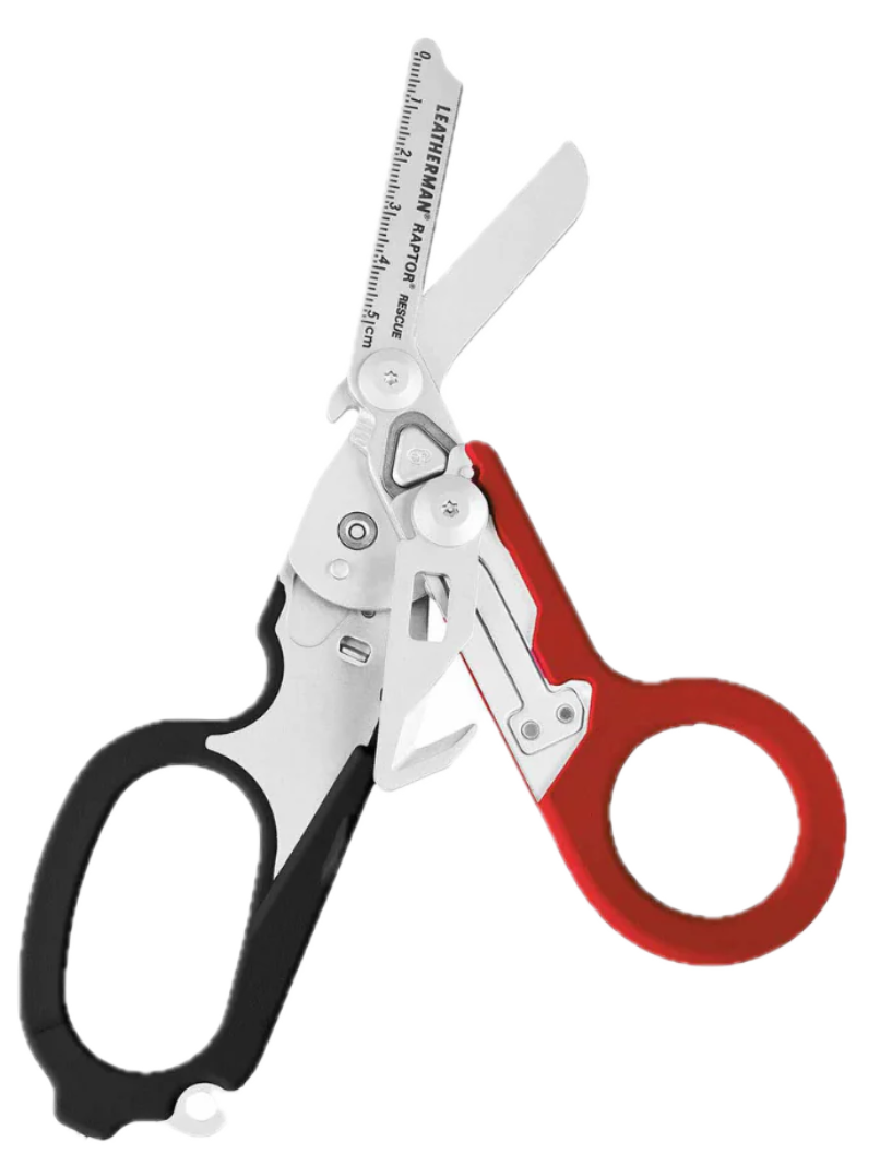 Leatherman Raptor multitool shears with red and black handles. Combines trauma shears, glass breaker, and strap cutter. TacMed Australia – essential emergency tool for rescue and field response.