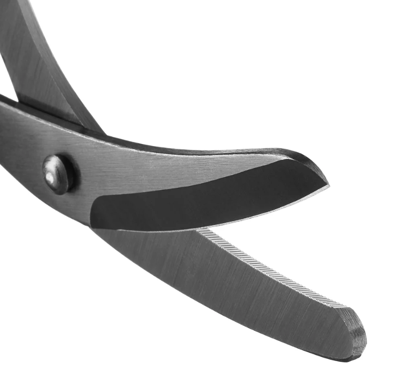 Close-up view of XSHEAR Mini blades showing thick, hardened stainless steel edge and blunt tip.