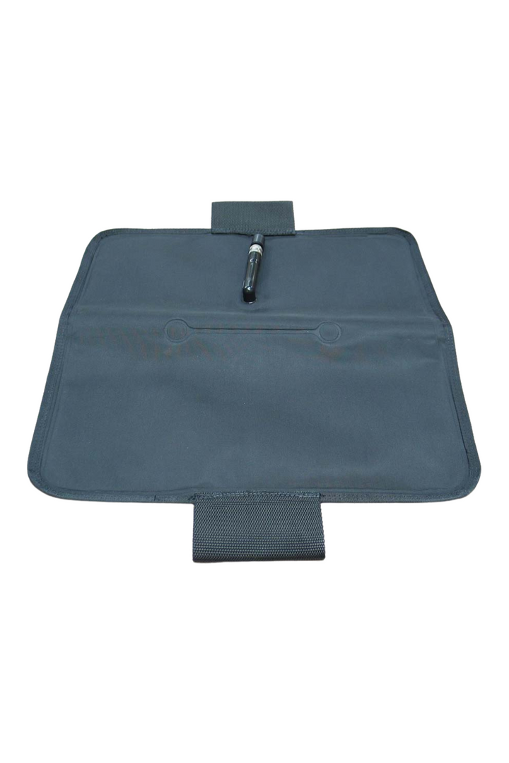 Deflated Skedco Inflatable Chest Pad in black on white background