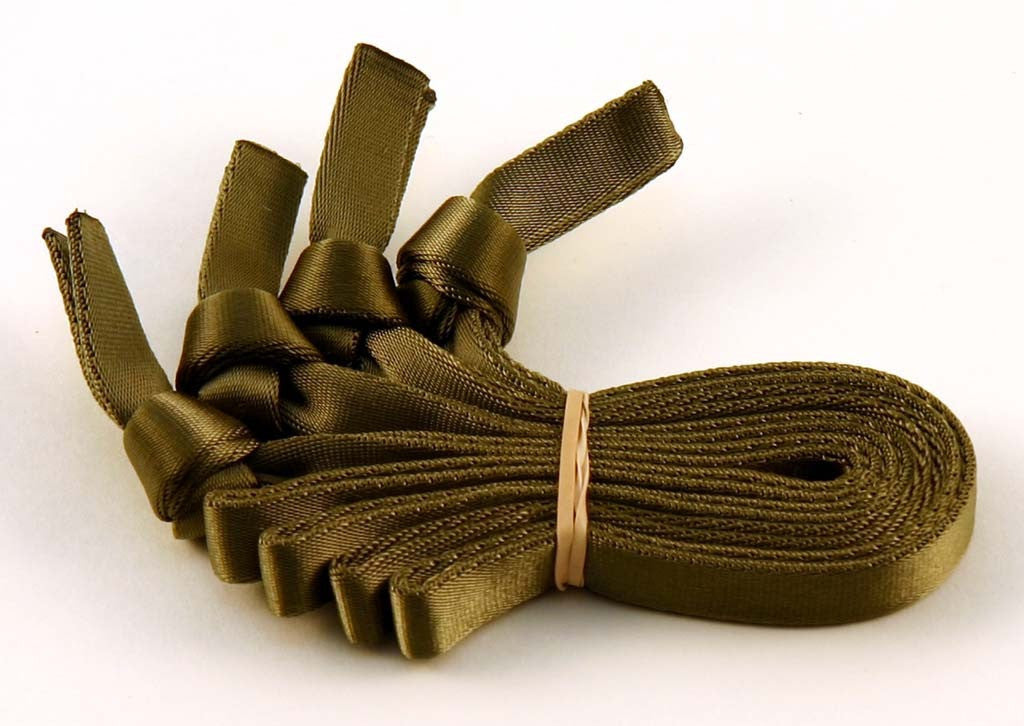 Set of four olive drab Skedco removable webbing handles neatly bundled