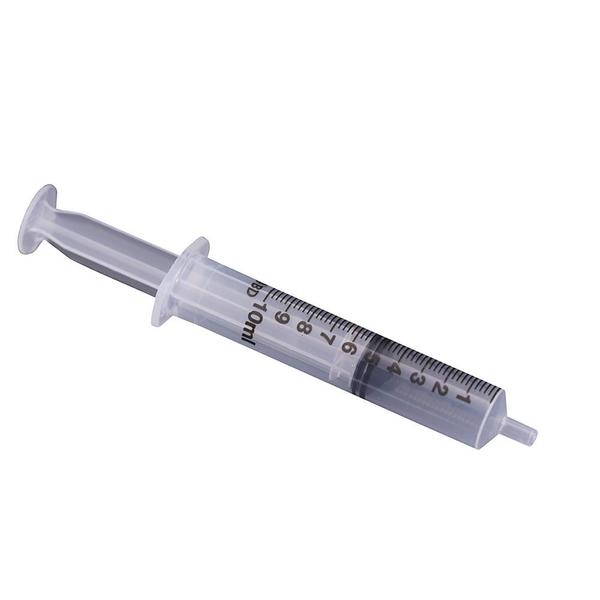 Syringe filled with clear blood simulant fluid for use in realistic trauma simulations.