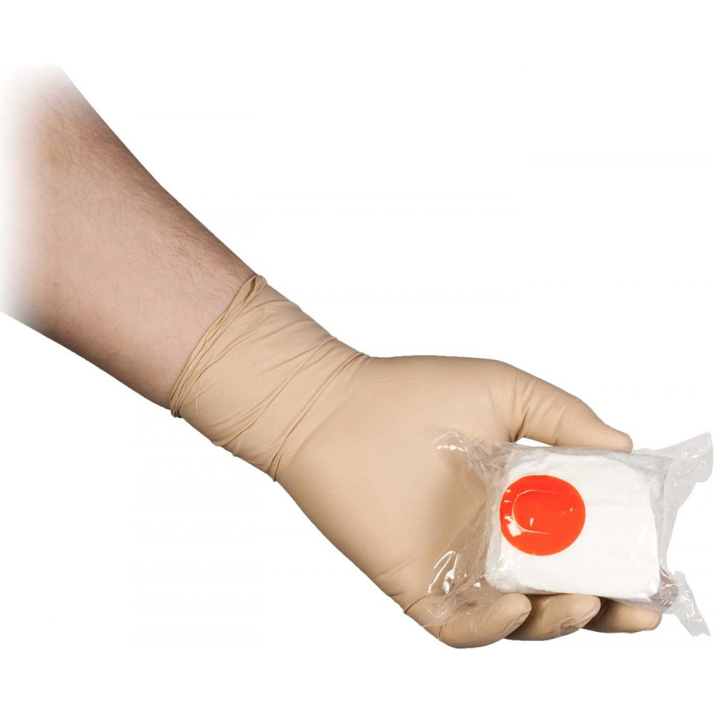 Gloved hand peeling red tab to open S-Rolled Gauze packaging. Designed for rapid deployment with single-gloved hand. TacMed Australia – compact gauze solution for field medics.