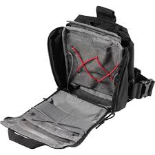 Interior of the UCR Thigh Rig open flat, showing elastic loops and compartments for medical gear.