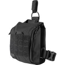 Side view of the UCR Thigh Rig showing compact profile and MOLLE webbing.