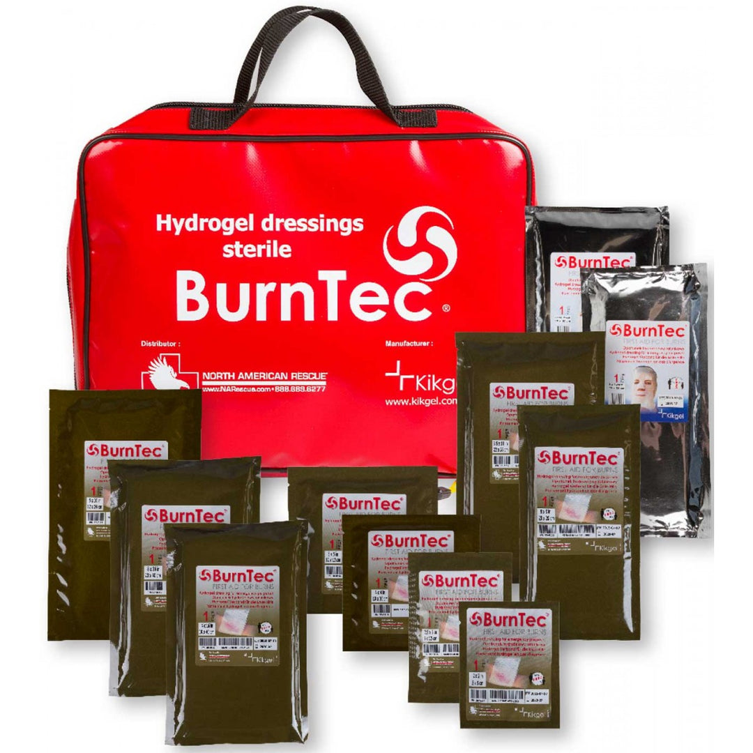 BurnTec large burns kit with red carry case and an assortment of sterile hydrogel dressings displayed.