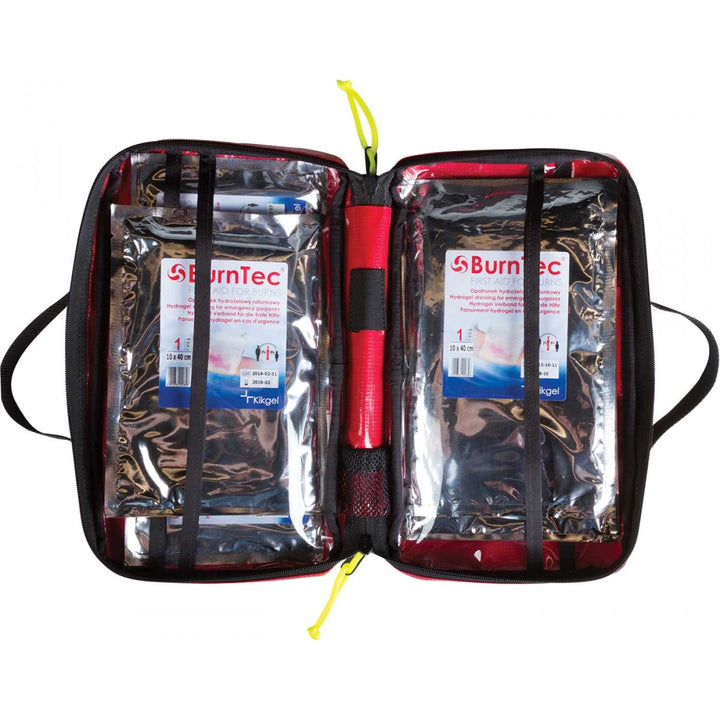 Open BurnTec kit showing organized compartments and burn dressings inside.