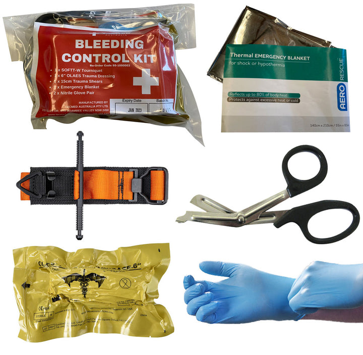 Contents of TacMed Bleeding Control Kit including SOF-T tourniquet, trauma shears, Olaes dressing, emergency blanket, and nitrile gloves. Built for critical interventions in the field. TacMed Australia – complete kit for rapid bleeding control.