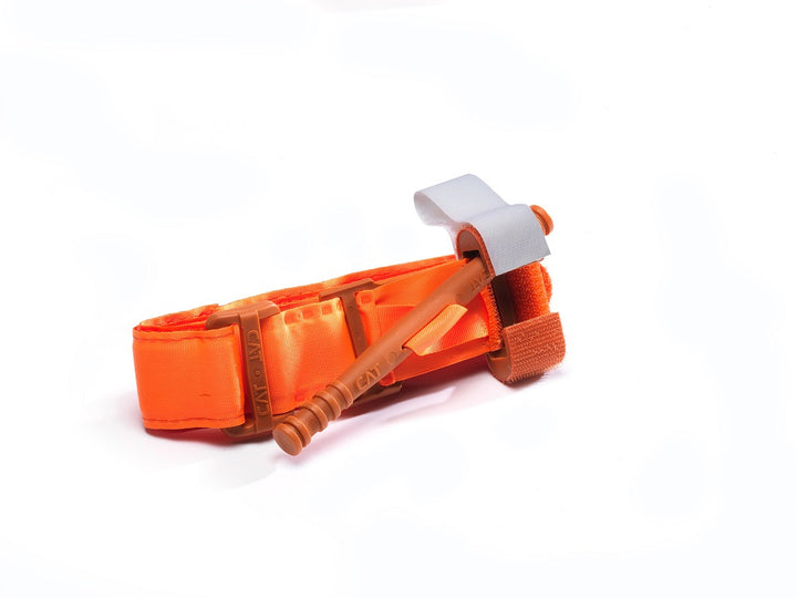 Orange CAT Tourniquet with white Velcro tab and windlass, designed for high-visibility use in civilian or industrial emergencies. TacMed Australia – trusted bleeding control for fast response teams.
