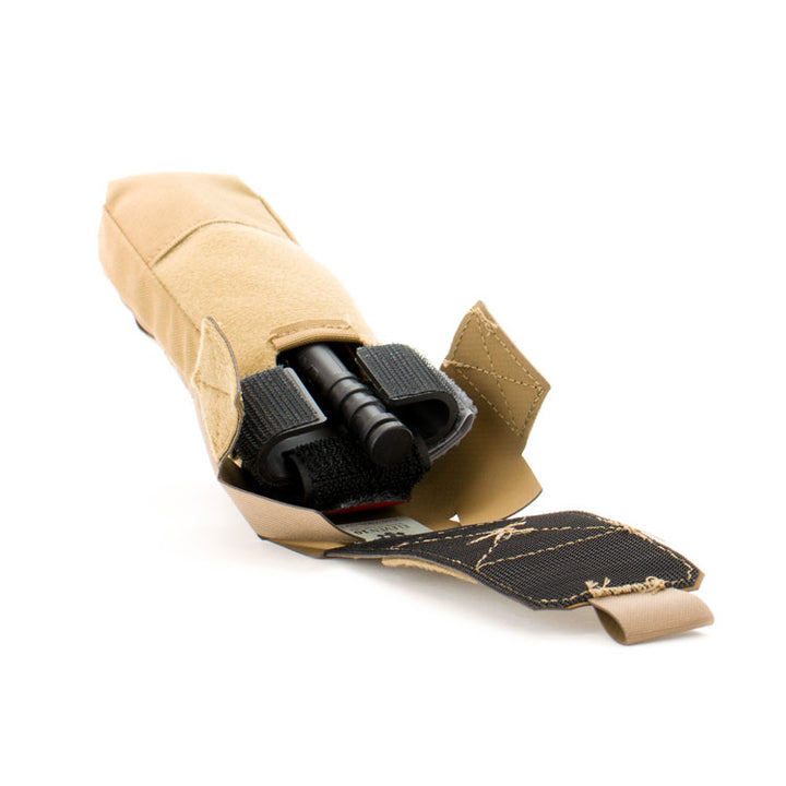 Tan Eleven 10 pouch with shears and tourniquet exposed inside.