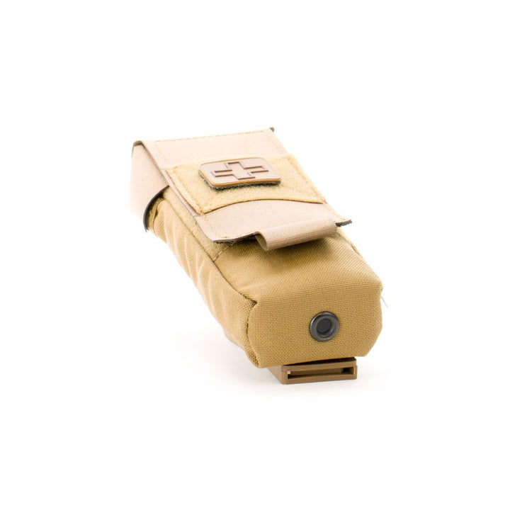 Angled view of tan Eleven 10 pouch with flap partially open.