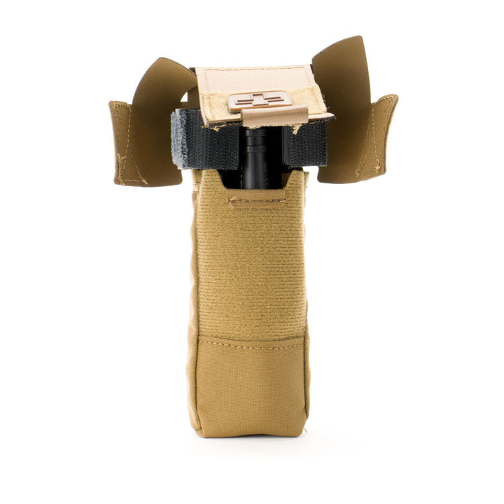 Tan Eleven 10 pouch standing upright with tourniquet deployed