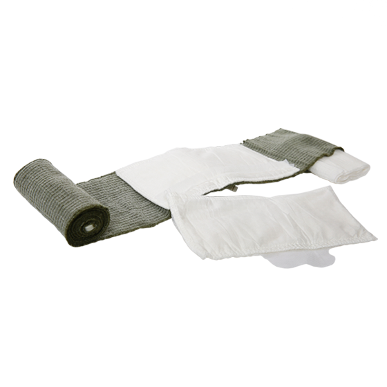 Unrolled Israeli tactical trauma bandage in military green with attached white absorbent dressing pad.