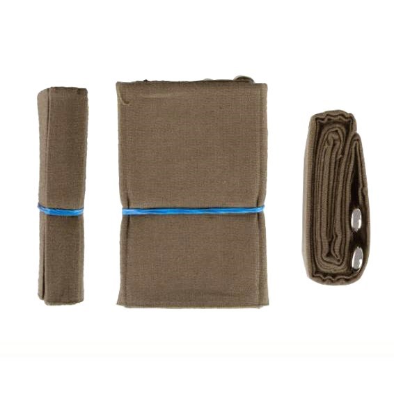 NAR triangular bandage folded into compact bundle with additional wrapped and rolled bandage components.