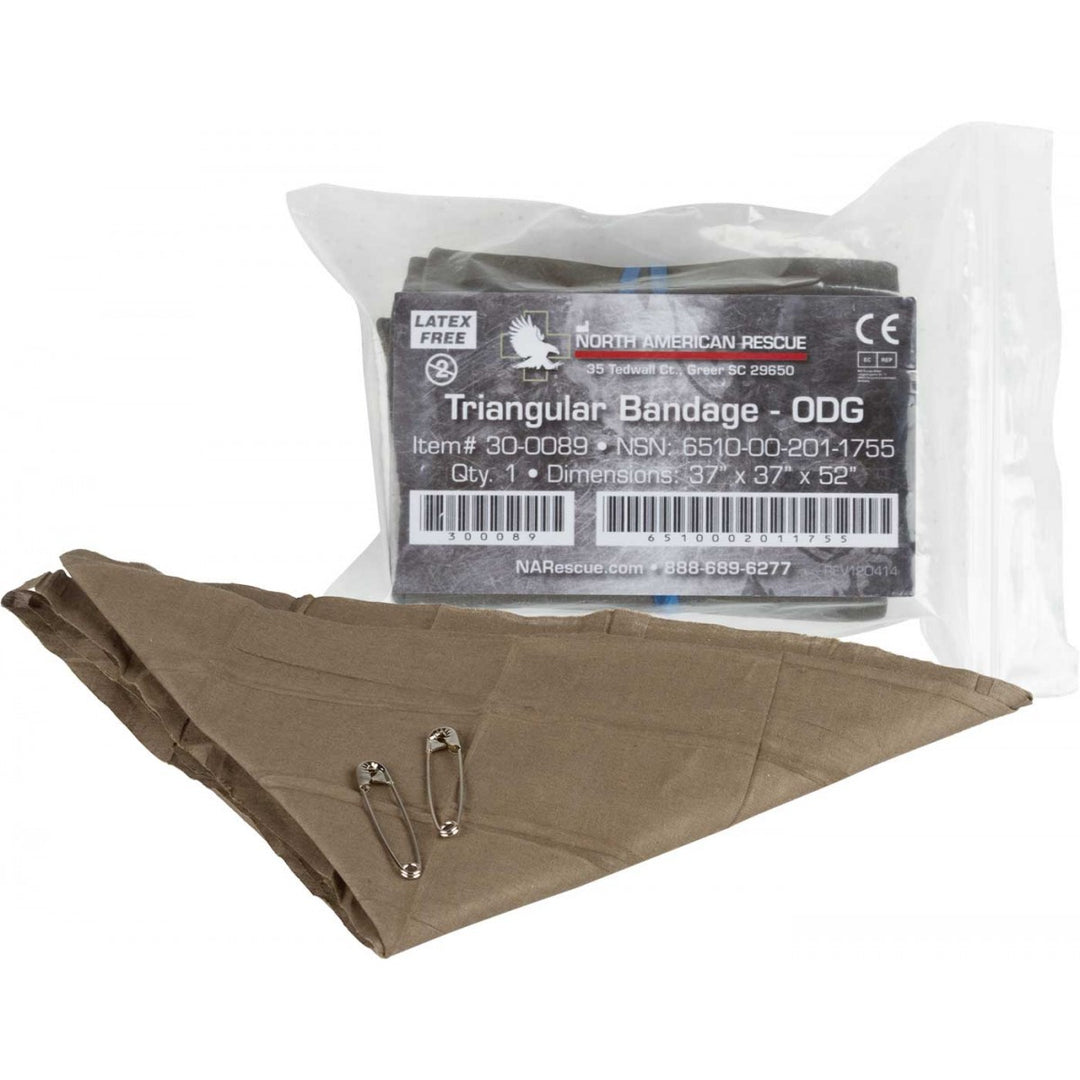 Vacuum-sealed NAR triangular bandage with olive drab green fabric partially unfolded and two safety pins.