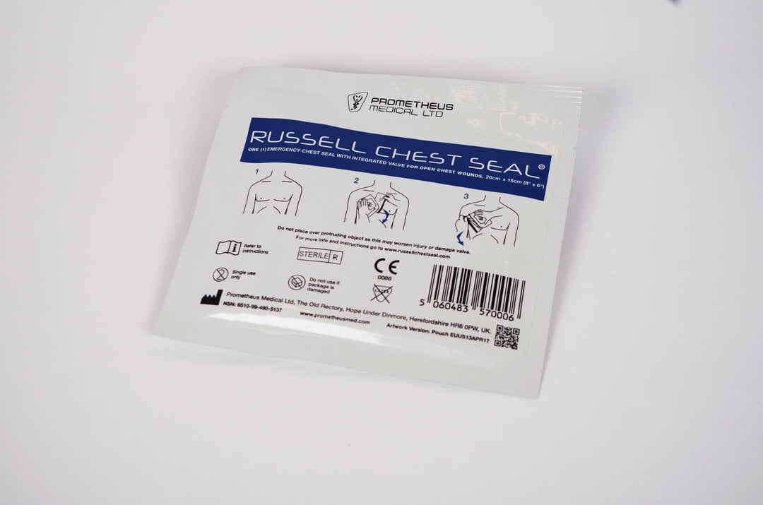 Front view of the packaged Russell Chest Seal with clear labeling, barcode, and instructional diagrams.