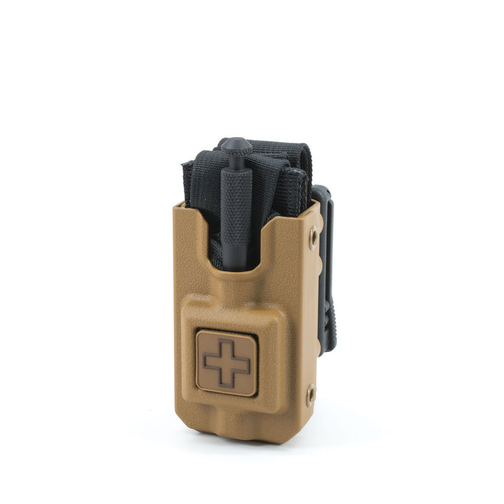 Eleven 10 RIGID TQ Case in coyote brown with tourniquet partially inserted. Injection-molded case designed for fast, one-handed access. TacMed Australia – rugged TQ holder for law enforcement and tactical medics.