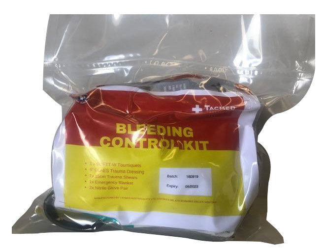 Vacuum-sealed Surf Life Saving bleeding control kit with visible red pouch and yellow label inside clear packaging.