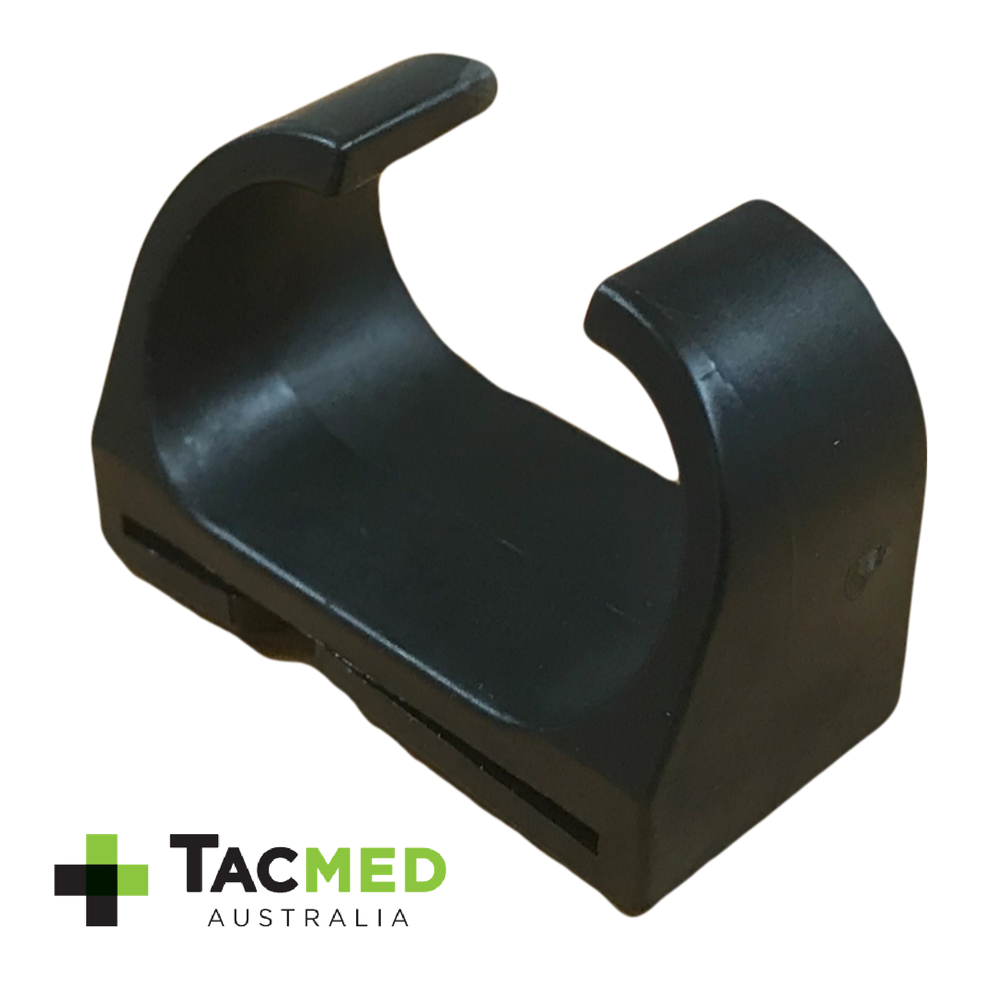 Isolated view of the black plastic tourniquet retention assistance clip on a white background with TacMed Australia branding.