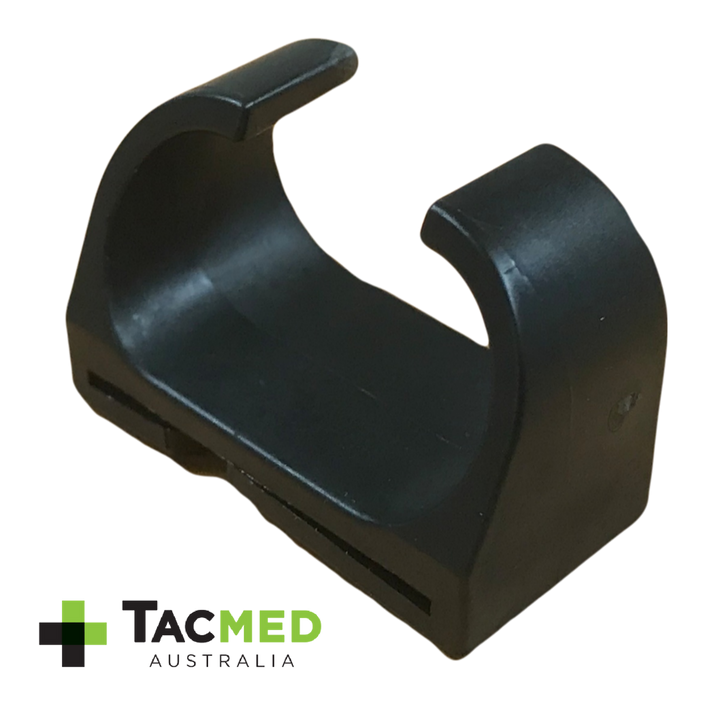 Isolated view of the black plastic tourniquet retention assistance clip on a white background with TacMed Australia branding.