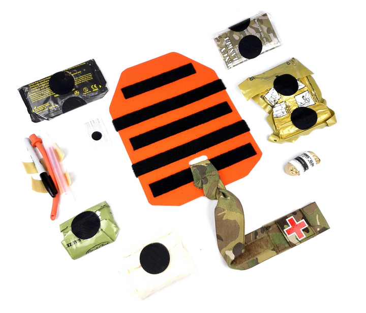 Top-down view of Med Plate 2.0 and its modular medical components spread out for rapid access.