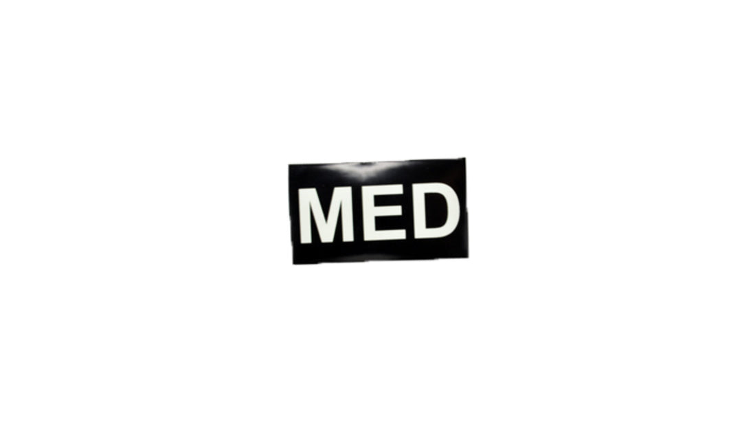 Black rectangular patch with bold white 'MED' text, glow-in-the-dark design, displayed on a white background.