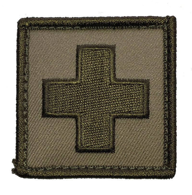 TacMed Medic Patch in olive drab green with embroidered cross symbol on a square hook-and-loop backing.
