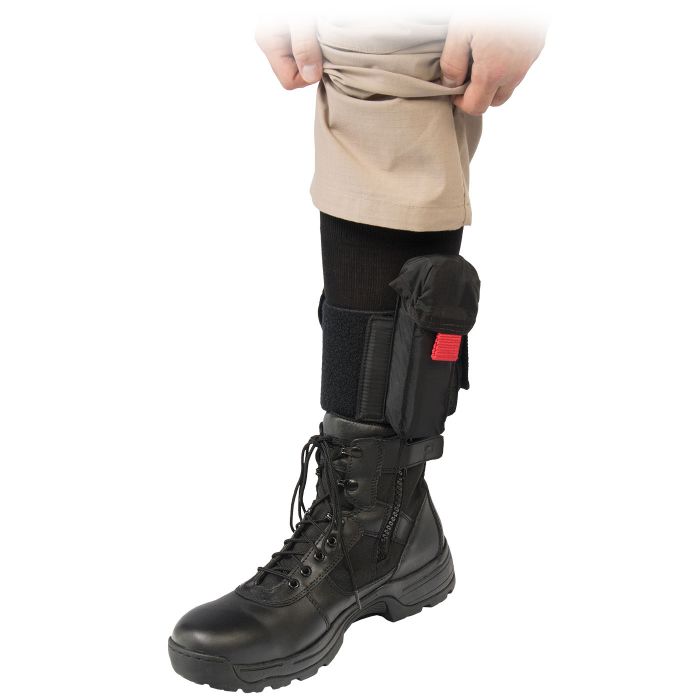 North American Rescue Ankle wrap dispayed on a man with black boots and his khaki pants rolled up