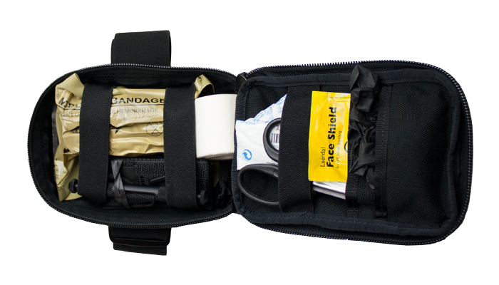 Top view of open LAPD trauma kit displaying organised medical contents.