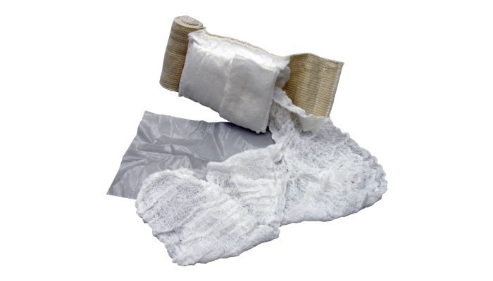 CPR face shield and pair of nitrile gloves laid out for use.