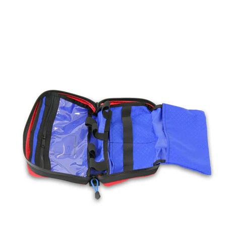 Open view of empty Guide II Pouch with organized internal compartments

