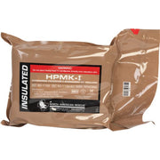 Vacuum-packaged HPMK-I™ (Insulated) pouch in tan, featuring NAR’s Red Tip Technology® tabs for rapid deployment. Includes branding and warnings, designed for compact storage of the insulated trauma kit