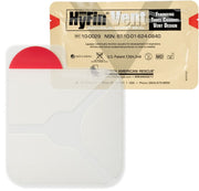 HyFin Vent Individual Chest Seal packaging with a beige foil pouch and red pull tab, featuring three-channel vent design. Includes product details: REF 10-0029, NSN 6510-01-624-0840, Made in America, U.S. Patent 7,504,549, and North American Rescue branding with contact info. The seal shows a clear, vented design with three channels.