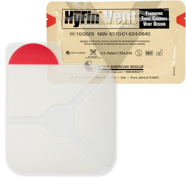 HyFin Vent Individual Chest Seal packaging with a beige foil pouch and red pull tab, featuring three-channel vent design. Includes product details: REF 10-0029, NSN 6510-01-624-0840, Made in America, U.S. Patent 7,504,549, and North American Rescue branding with contact info. The seal shows a clear, vented design with three channels.