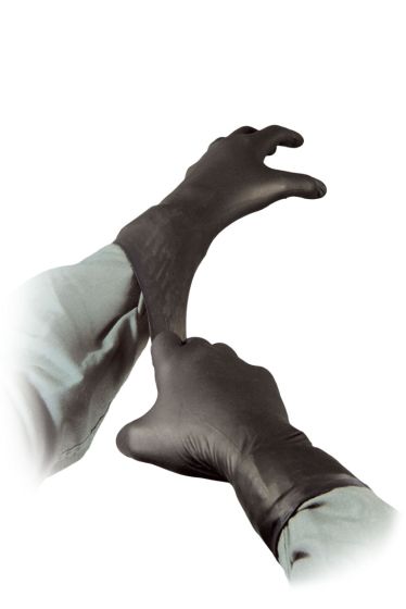 Gloved hands pulling on black nitrile gloves – textured and form-fitting design

