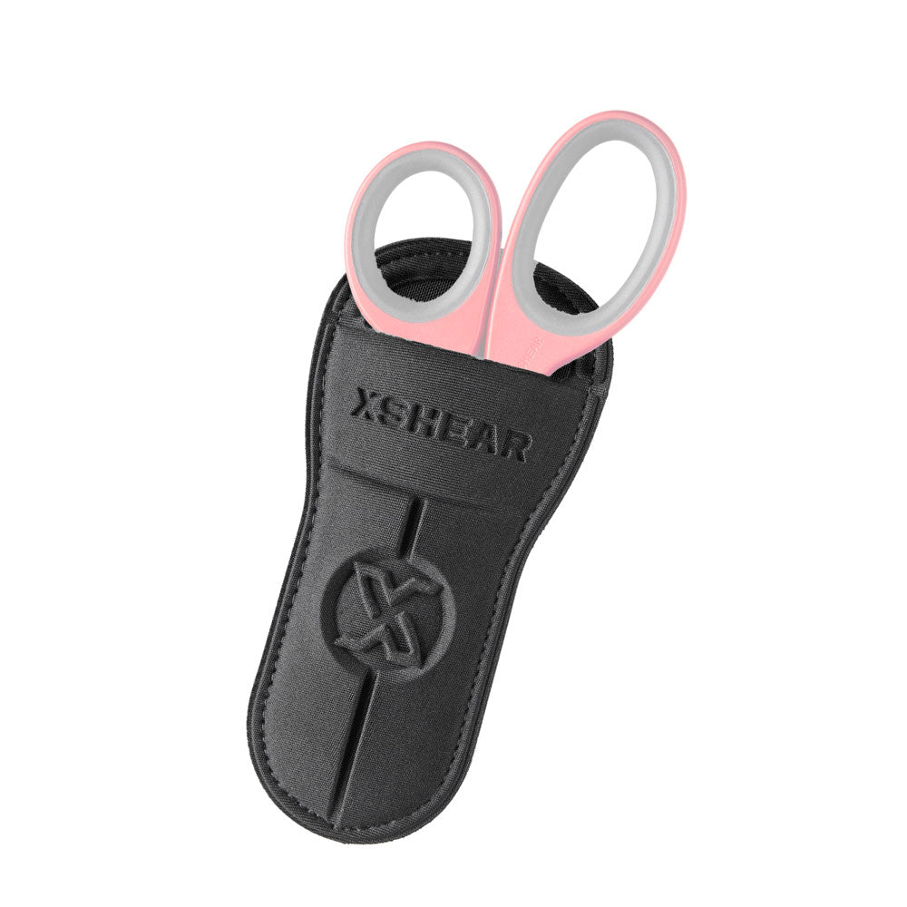 XShear Soft Holster with trauma shears inserted, demonstrating secure storage and easy access design.