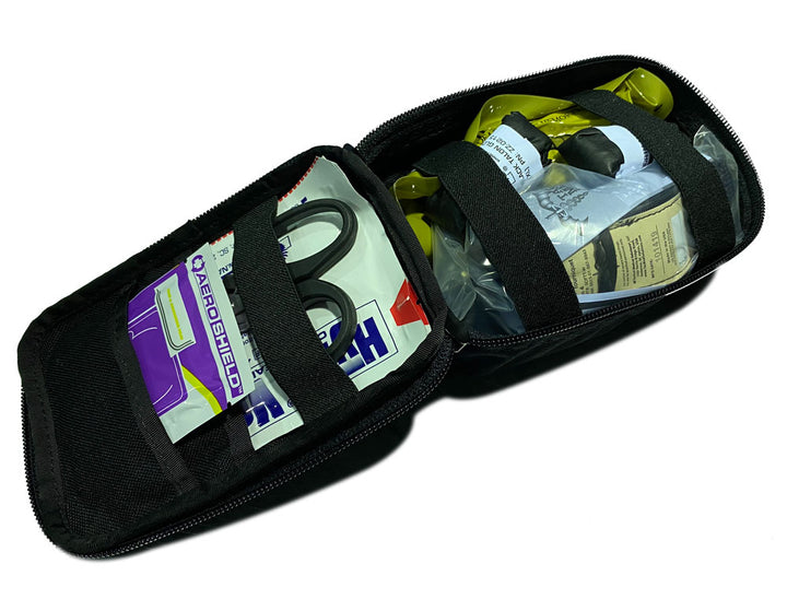 Operator IFAK Kit fully opened with internal elastic loops securing trauma supplies. Designed for rapid access in high-stress medical situations. TacMed Australia – efficient internal layout for combat medics.