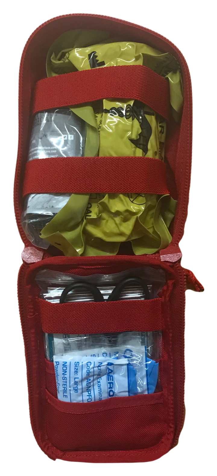 Interior of the bleeding control kit showing organised contents in elastic loops.