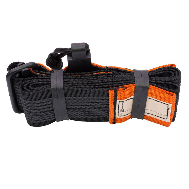 Rolled K9 Tourniquet showing orange identification tab and secured strap system