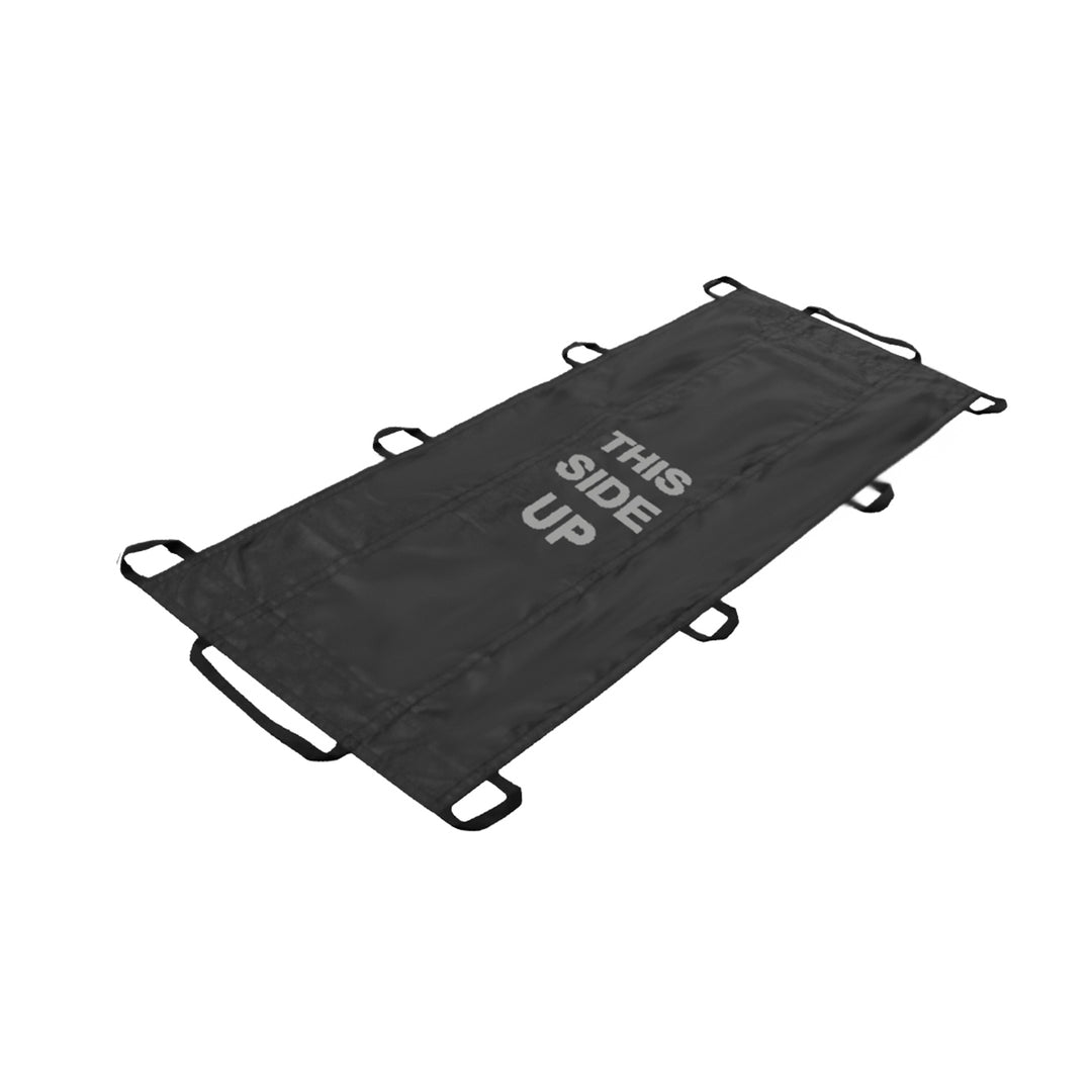 Black North American Rescue Quik Litter out of packaging and laying flat on a white background. THIS SIDE UP is displayed on the quik litter. Used in wilderness and remote emergency situations for patient extradition.  